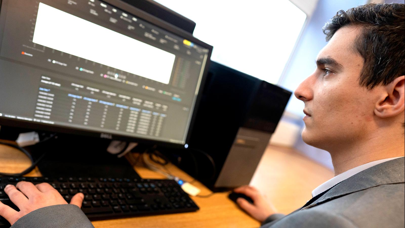 Man looking at computer screen